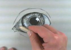 Draw an eye wuith charcoal - step 5- fill in area around the pupil