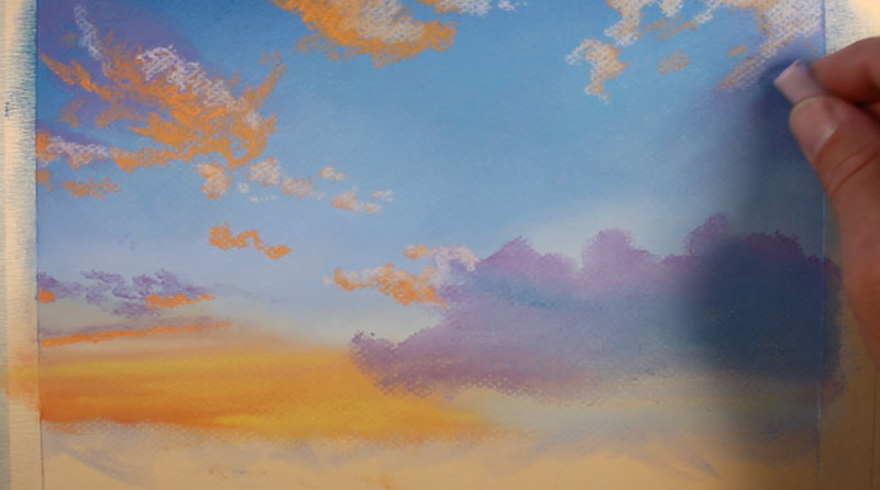 Drawing clouds with pastel