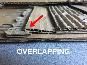 Overlapping shapes in low relief sculpture
