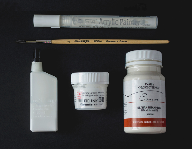 Tools and pens for fixing mistakes in a pen and ink drawing
