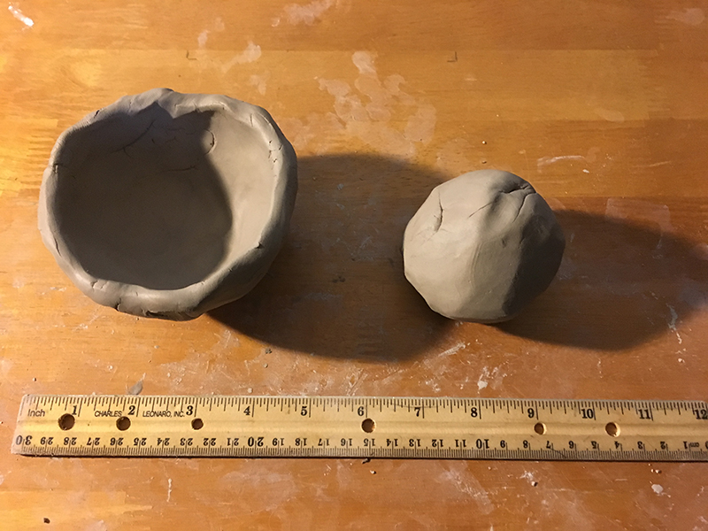 Make sure each clay half-sphere is equal in width