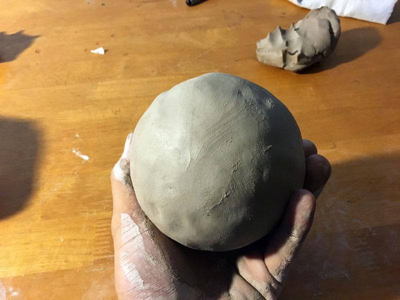 Sculpted clay ball