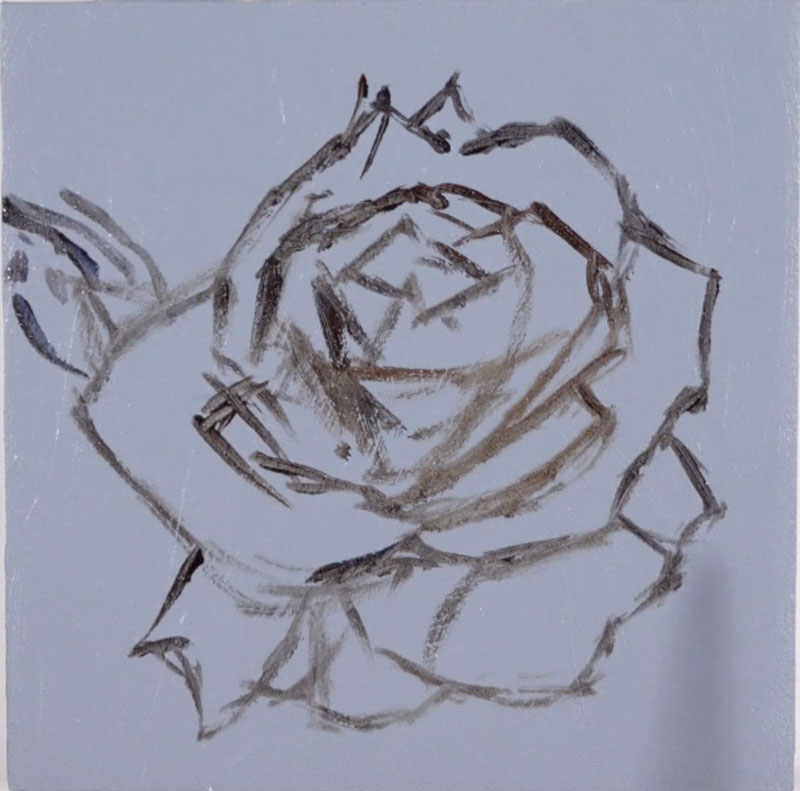 Sketching the contours of the rose with oils