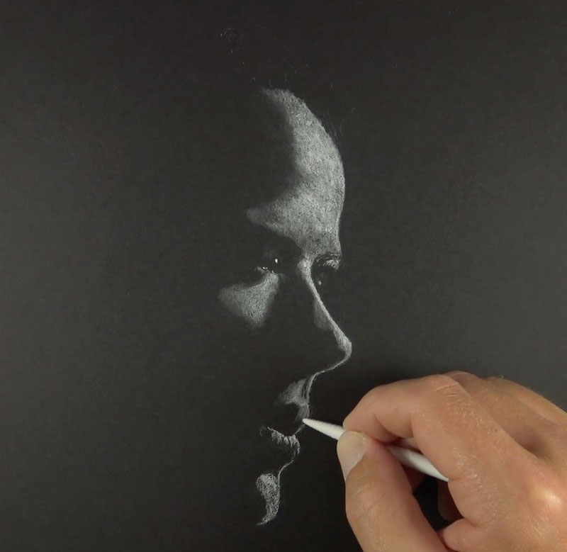 Drawing on black paper using white charcoal 