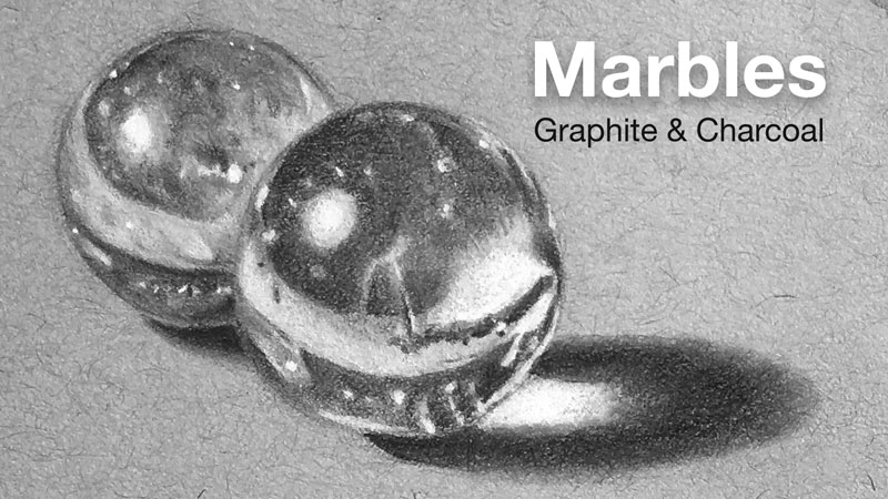 How to draw marbles with graphite and charcoal